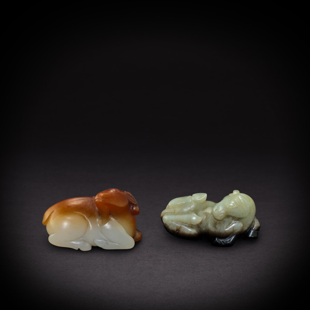 View full screen - View 1 of Lot 3545. A celadon jade horse and a white jade ram, Qing dynasty, 17th - 18th century | 清十七至十八世紀 青玉馬及白玉羊.