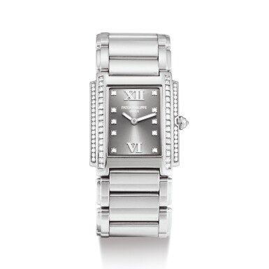 View full screen - View 1 of Lot 2130. PATEK PHILIPPE | TWENTY~4, REFERENCE 4910/20 A WHITE GOLD AND DIAMOND-SET WRISTWATCH WITH BRACELET, CIRCA 2002" | 百達翡麗 | Twenty~4 型號4910/20 白金鑲鑽石鏈帶腕錶,機芯編號1679846,錶殼編號4137665,約2002年製".