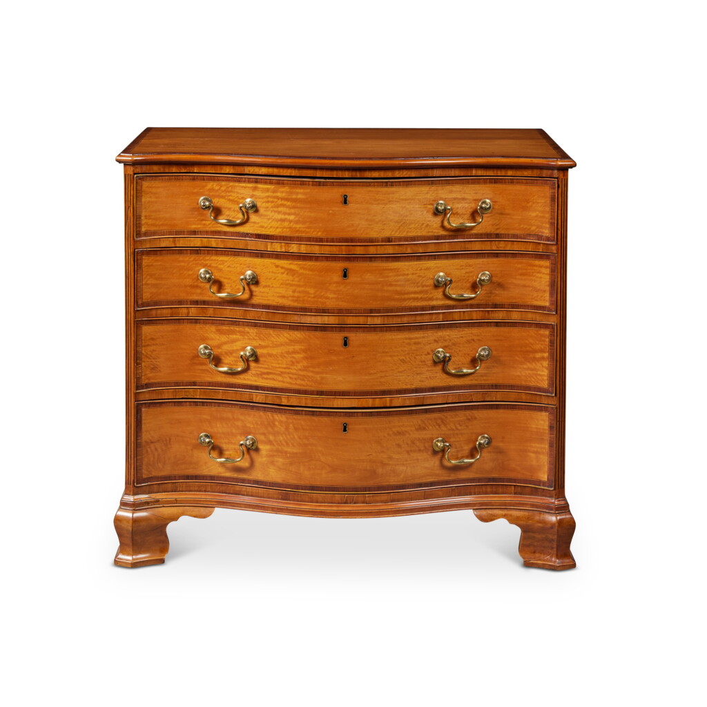 View full screen - View 1 of Lot 411. A George III Satinwood and Rosewood-Crossbanded Chest-Of-Drawers, Circa 1770.