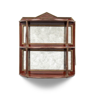View full screen - View 1 of Lot 844. A gilt-brass-mounted mahogany hanging shelf, France or England, 19th century.