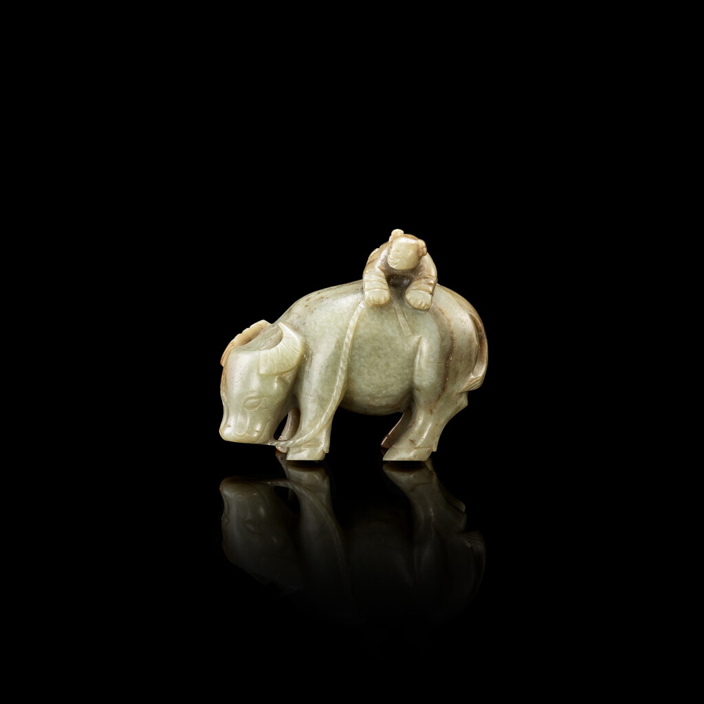 View full screen - View 1 of Lot 3044. A celadon and russet jade 'buffalo and boy' group, 17th century 十七世紀 青玉童子牧牛.