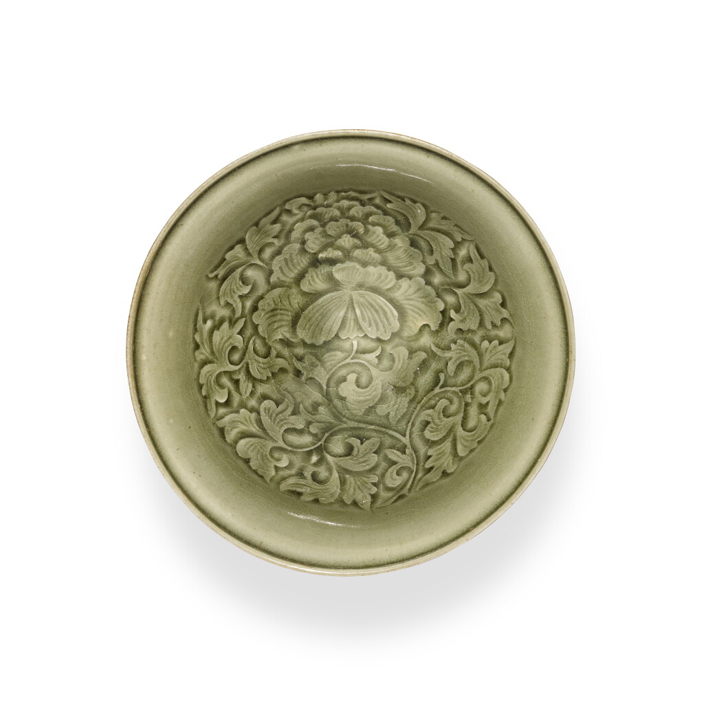 View full screen - View 1 of Lot 51. A moulded 'Yaozhou' celadon-glazed 'peony' bowl, Northern Song / Jin dynasty | 北宋 / 金 耀州窰青釉印花牡丹紋盌.