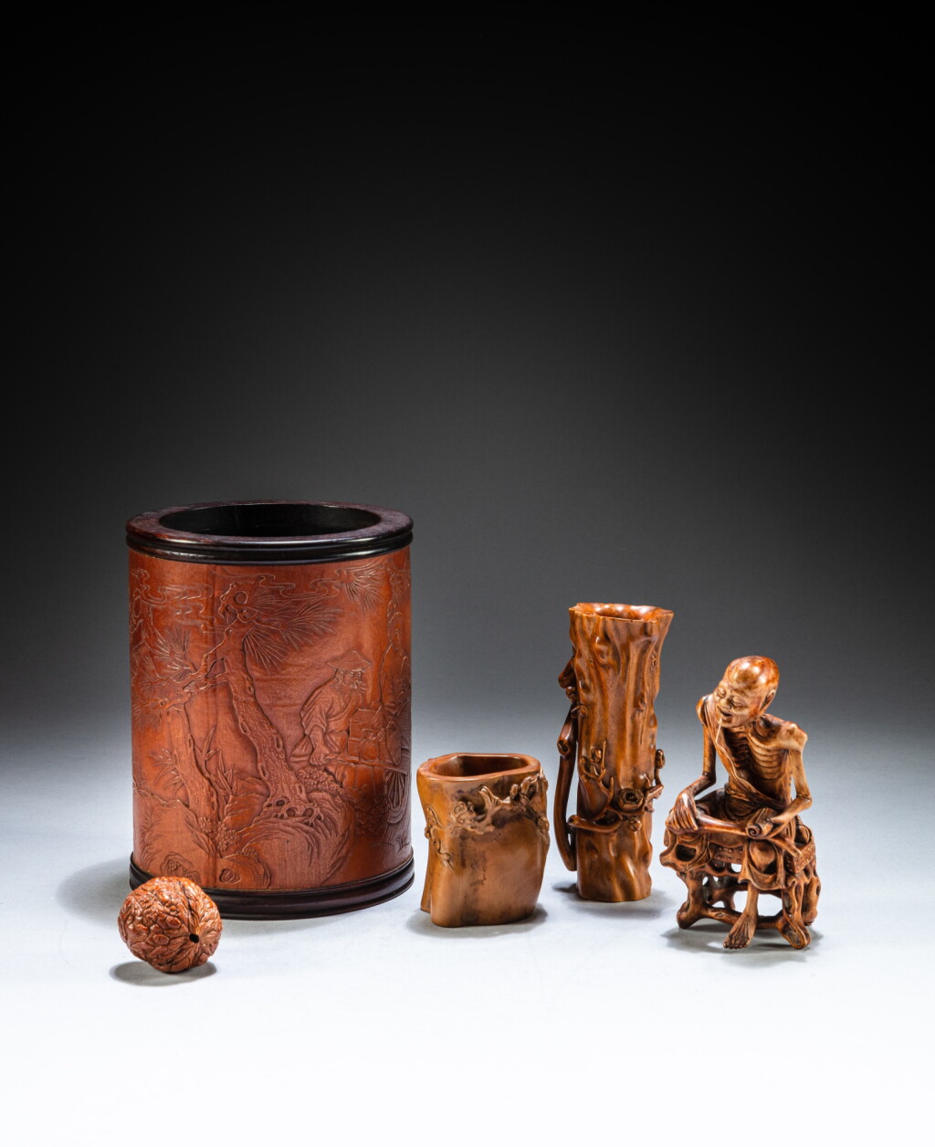 View full screen - View 1 of Lot 182. A group of five wood carvings, Qing dynasty - 20th century | 清至二十世紀 木雕飾一組五件.