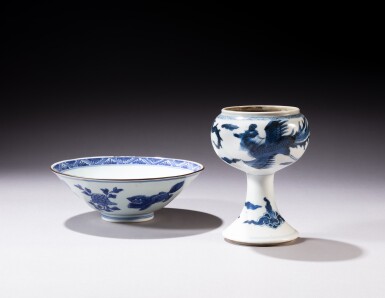 View full screen - View 1 of Lot 272. A blue and white bowl, Transitional period, and a blue and white stem cup, Qing dynasty, Kangxi period.