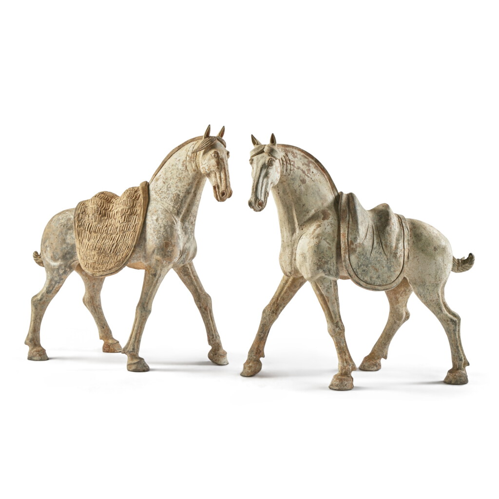 View full screen - View 1 of Lot 240. A pair of painted gray pottery figures of horses, Tang dynasty.