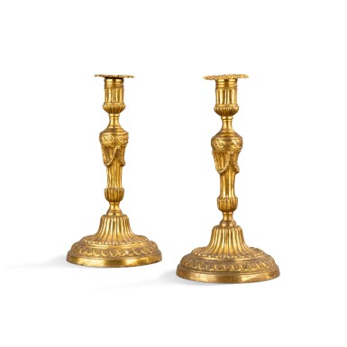 View full screen - View 1 of Lot 211. A pair of gilt-bronze candlesticks, Louis XVI, circa 1780 | Paire de flambeaux en bronze doré d'époque Louis XVI, vers 1780.