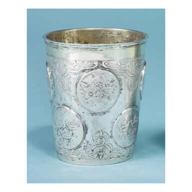 View full screen - View 1 of Lot 108. A GERMAN PARCEL-GILT COIN-INSET BEAKER, MAKER'S MARK M OR H. I.?, BRESLAU, 1712-1721.