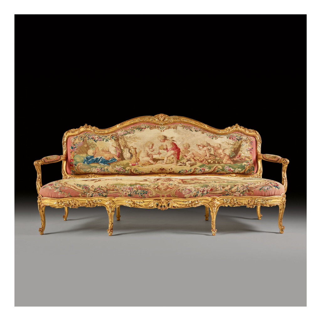 View full screen - View 1 of Lot 182. A LATE LOUIS XV GILTWOOD CANAPE A CHASSIS, CIRCA 1765.