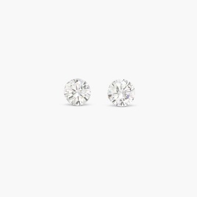View full screen - View 1 of Lot 119. Two Unmounted Diamonds weighing 1.04 and 1.02 carats.