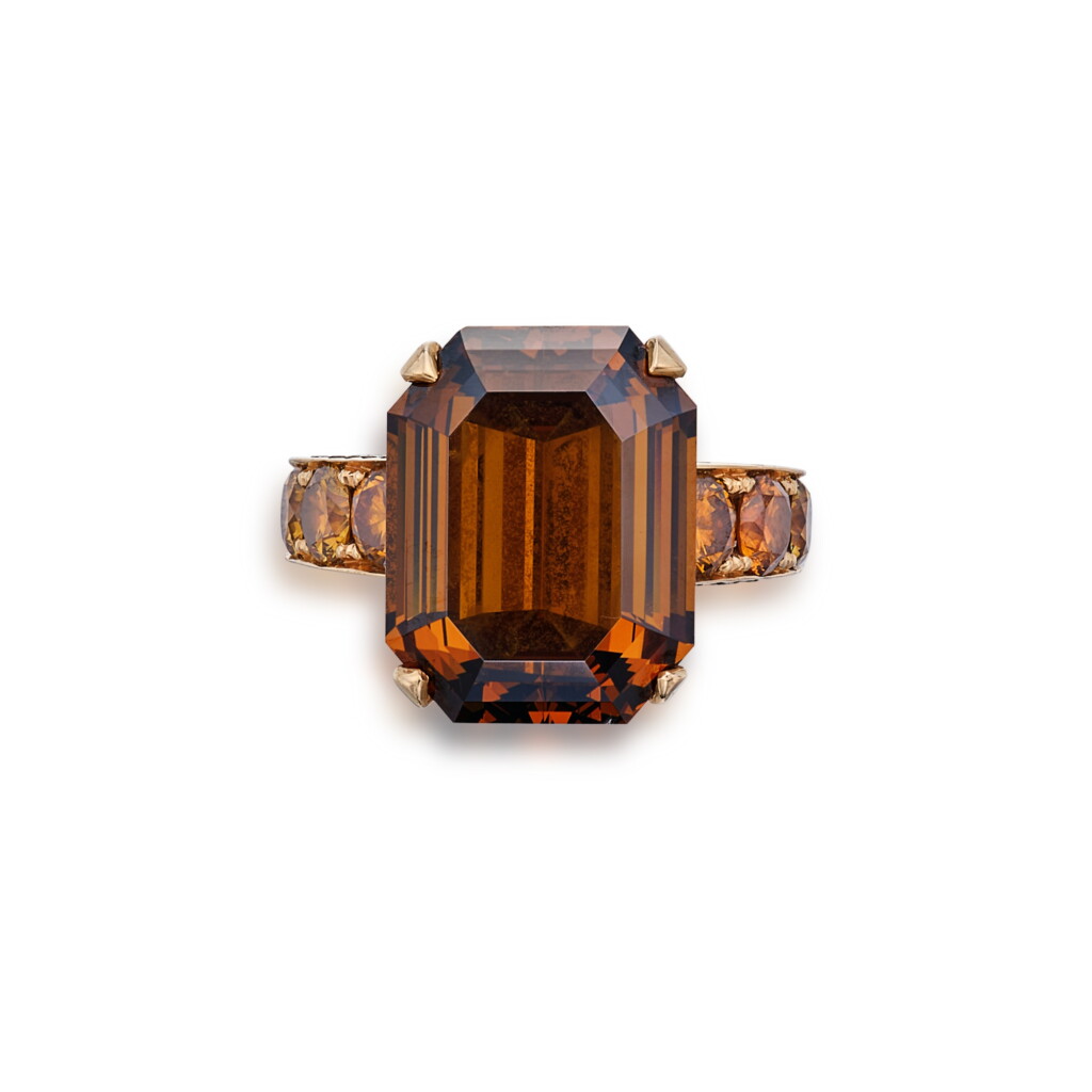 View full screen - View 1 of Lot 83. Fancy Dark Orangy Brown Diamond and Diamond Ring.