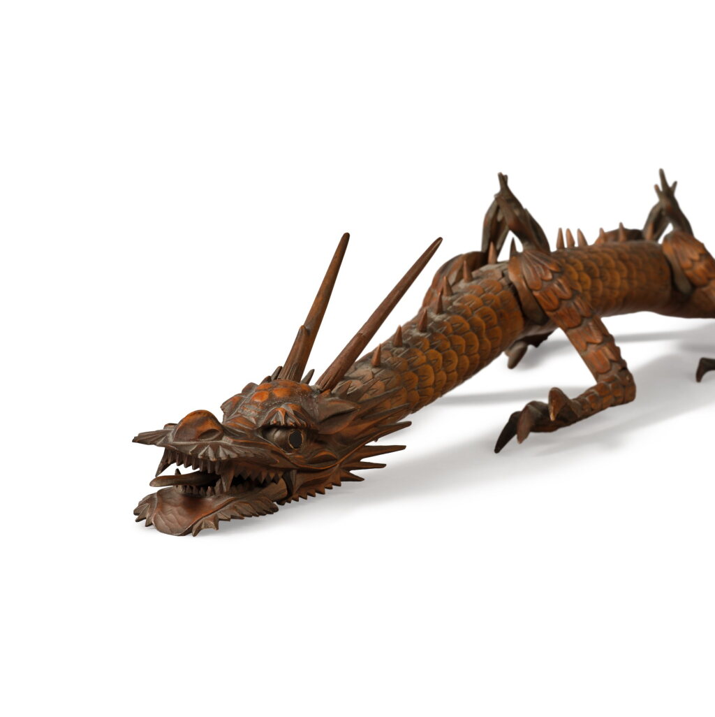 View full screen - View 1 of Lot 613. A Boxwood Carved Articulated Model of a Dragon (Jizai Okimono), Meiji Period, Late 19th Century | 木製龍型自在置物、明治時代、19世紀後期 | 日本 明治 十九世紀末 黃楊木雕龍形自在置物.