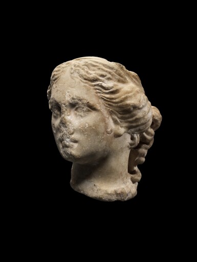 View full screen - View 1 of Lot 40. A Roman Marble Head of Aphrodite or a Muse, circa 1st Century A.D..