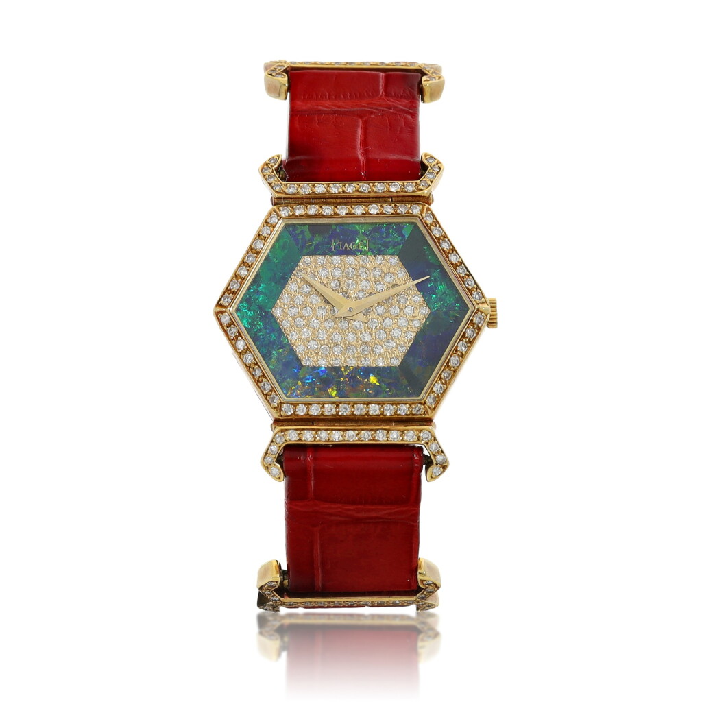 View full screen - View 1 of Lot 8325. Reference 9558 DB | A yellow gold and diamond-set wristwatch with opal dial, Circa 1980 | 伯爵 型號9558 DB | 黃金鑲鑽石腕錶,備蛋白石錶盤,約1980年製.