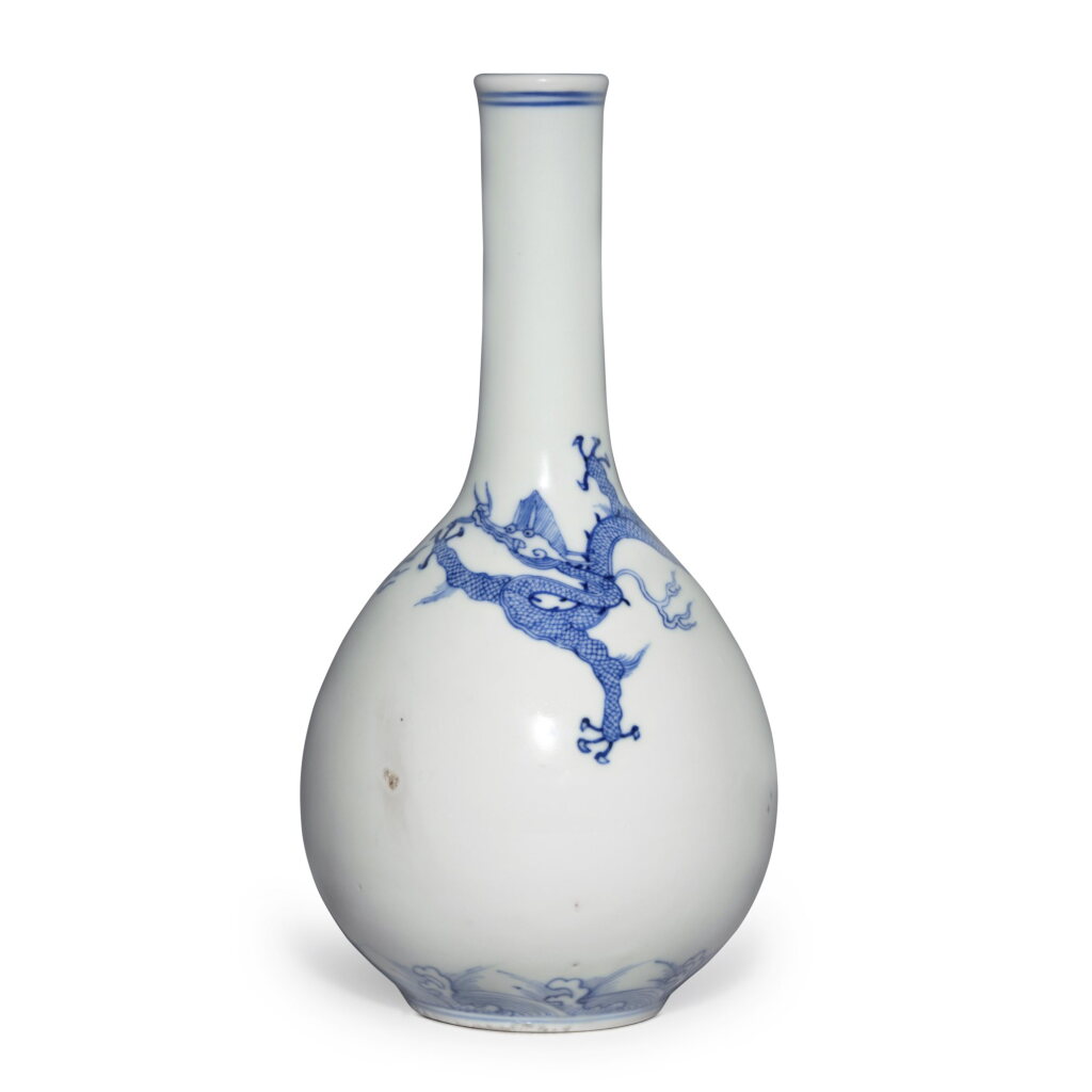 View full screen - View 1 of Lot 407. A blue and white 'dragon' bottle vase, Qing dynasty, Kangxi period | 清康熙 青花趕珠龍紋長頸瓶.
