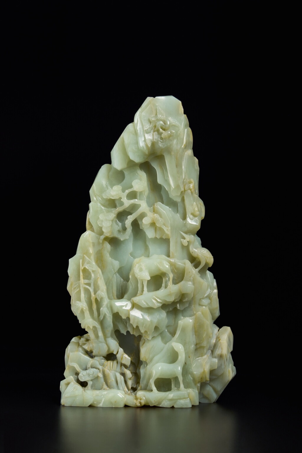View full screen - View 1 of Lot 220. A large celadon jade 'deer' boulder, Qing dynasty, early 18th century.