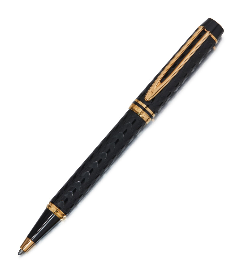 View full screen - View 1 of Lot 104. WATERMAN | A BLACK ENGRAVED RESIN AND GOLD PLATED BALLPOINT PEN, CIRCA 2000.