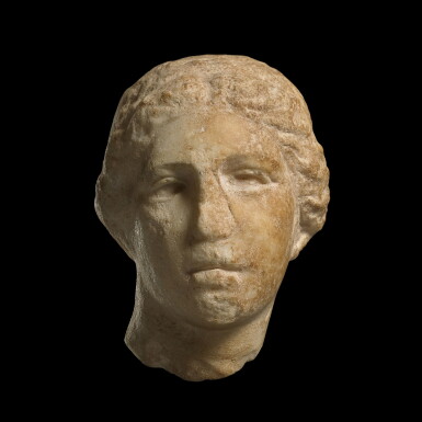 View full screen - View 1 of Lot 25. A GREEK MARBLE HEAD OF A GODDESS, CIRCA MID 4TH CENTURY B.C..