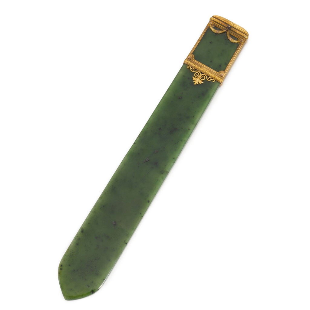 View full screen - View 1 of Lot 465. A Fabergé varicoloured gold-mounted nephrite letter-opener, workmaster Michael Perkhin, St Petersburg, circa 1890.
