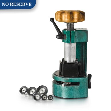 View full screen - View 1 of Lot 8012. ROLEX | REFERENCE 1005 A STEEL CASE OPENING TOOL WITH 6 SUCTION HEADS OF DIFFERENT SIZES, CIRCA 1975 .