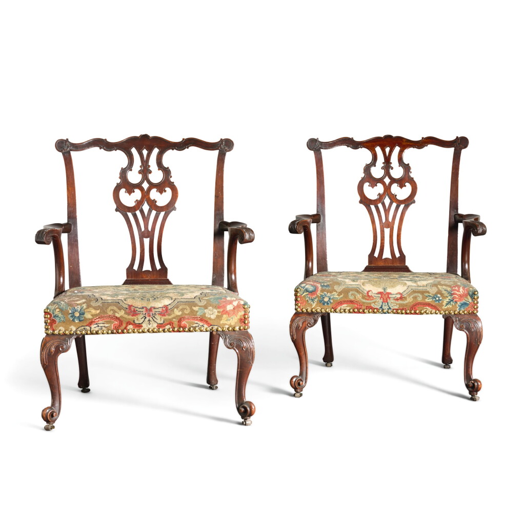 View full screen - View 1 of Lot 50. A PAIR OF GEORGE II CARVED MAHOGANY OPEN ARMCHAIRS, CIRCA 1755.
