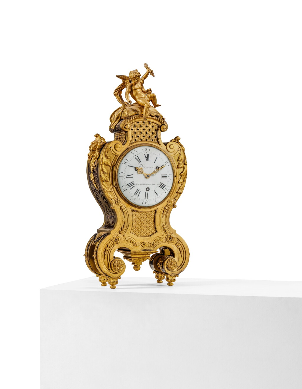 View full screen - View 1 of Lot 62. A Régence gilt-bronze and gilt-brass, tinted pearwood and tortoiseshell marquetry quarter striking mantel clock, attributed to Charles Cressent, the mechanism by Claude Martinot, Paris, dated 1726.