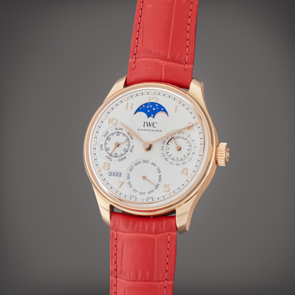 View full screen - View 1 of Lot 131. Reference IW5033-02 Portugieser | A pink gold automatic perpetual calendar wristwatch with moon phases and power reserve indication, Circa 2022.
