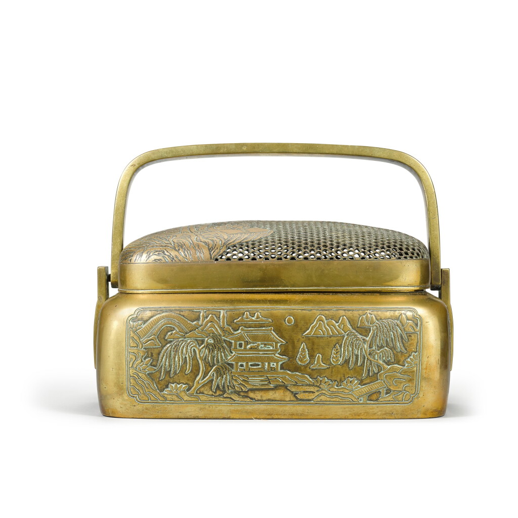 View full screen - View 1 of Lot 49. A rare large bronze reticulated 'crane and deer' foot warmer, with a mark reading Wang Feng jiang zhi 17th/18th century | 十七/十八世紀 銅鶴鹿同春紋火踏 《王鳳江製》刻款.