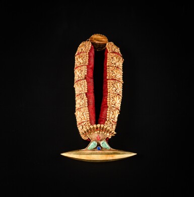 View full screen - View 1 of Lot 34. A inlaid gilt-bronze and repoussé necklace, Nepal, circa 1900 | 尼泊爾 約1900年 鎏金嵌寶項鍊.