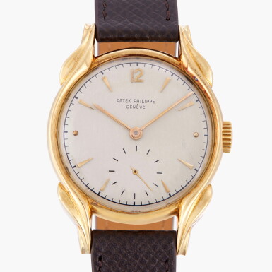 View full screen - View 1 of Lot 34. 'Flame Lugs', Reference 2431 | A yellow gold wristwatch with flame lugs | Circa 1950.