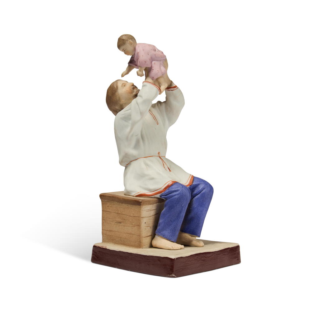 View full screen - View 1 of Lot 130. A Porcelain Figural Group of a Peasant Playing with Child, Probably Gardner Porcelain Factory, Verbilki, late 19th Century.