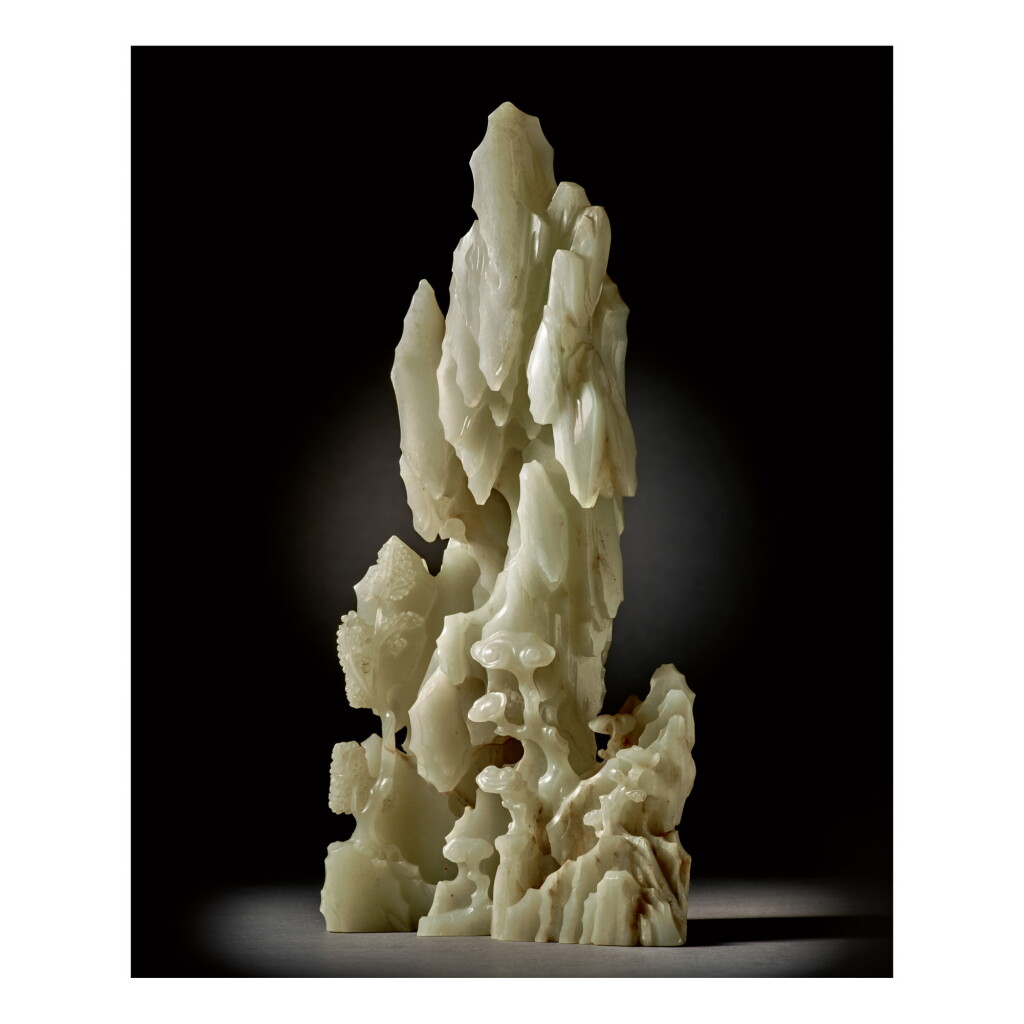 View full screen - View 1 of Lot 211. AN EXTRAORDINARY AND RARE PALE CELADON JADE MOUNTAIN, QING DYNASTY, 18TH CENTURY.