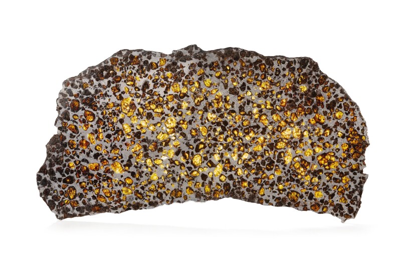 A Large slice of the Fukang Pallasite meteorite, Xinjiang, Uygur, China. @ Sothebys