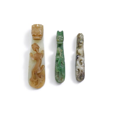 View full screen - View 1 of Lot 245. THREE ARCHAISTIC JADE BELT HOOKS, QING DYNASTY, 18TH CENTURY | 清十八世紀 玉雕螭龍紋帶鉤一組三件.