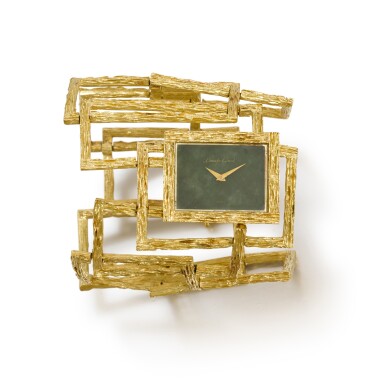 View full screen - View 1 of Lot 318. BUECHE GIROD | A LADY'S YELLOW GOLD RECTANGULAR BRACELET WATCH WITH AGATE DIAL, MADE 1971 .