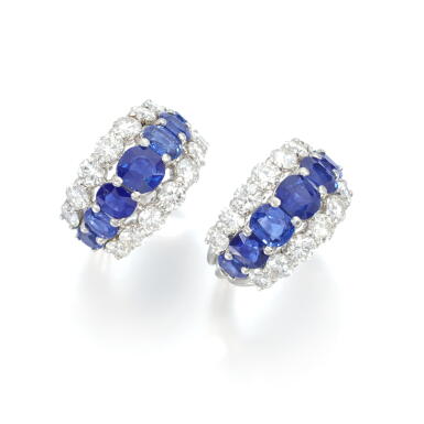 View full screen - View 1 of Lot 502. Pair of sapphire and diamond rings.