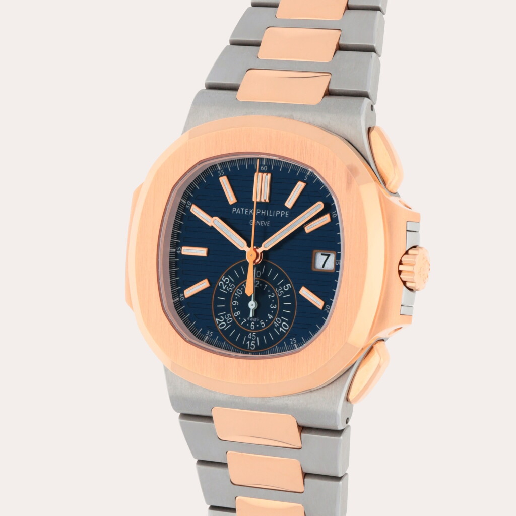 View full screen - View 1 of Lot 65. Nautilus, Reference 5980/1AR-001 | A stainless steel and pink gold flyback chronograph wristwatch with date and bracelet | Circa 2019.