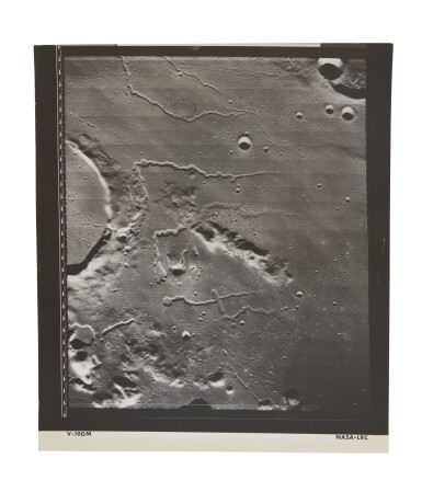 View full screen - View 1 of Lot 206. LUNAR ORBITER V | PRINZ CRATER IN THE OCEANUS PROCELLARUM, WITH THE RIMAE PRINZ EXTENDING TO THE RIGHT, TAKEN 06-18 AUGUST, 1967..