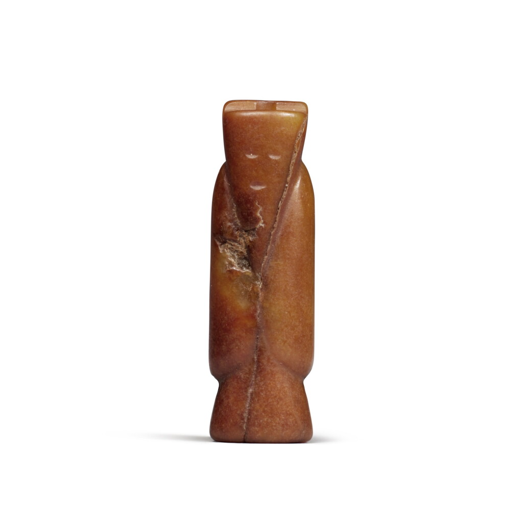 View full screen - View 1 of Lot 146. A russet jade 'figure' pendant, Han dynasty | 漢 玉人形珮.