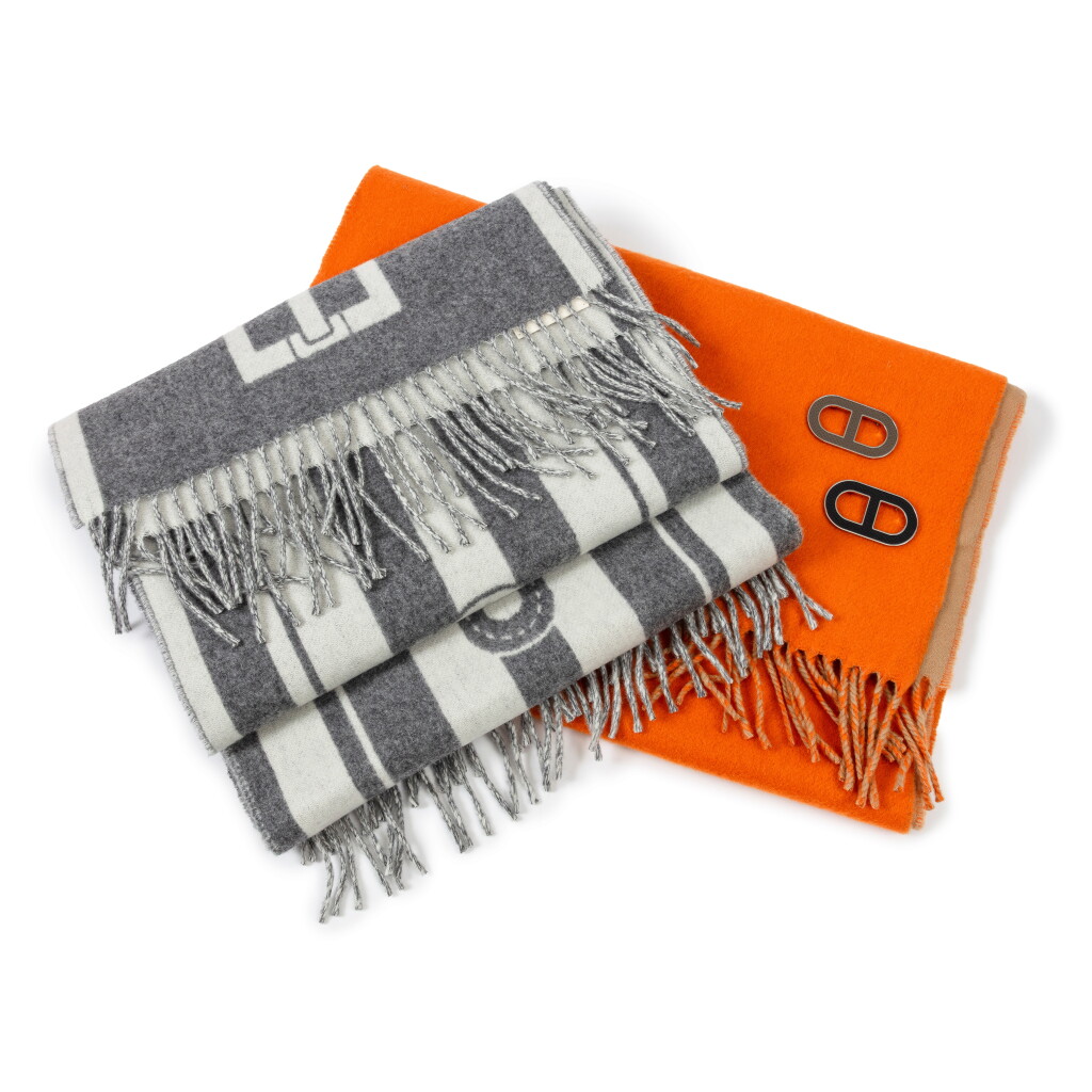 View full screen - View 1 of Lot 792. Set of Five: One Orange and Beige Cashmere Fringe Scarf, Two Grey and White Cashmere Fringe Scarves, One Black Leather Broche Chaîne d'Ancre Palladium Hardware and One Etoupe Leather Broche Chaîne d'Ancre Palladium Hardware.