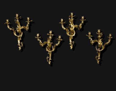 View full screen - View 1 of Lot 108. A Set of Four Louis XV Style Gilt Bronze Three-Branch Wall Lights After the Model by Jean-Claude Duplessis, Circa 1850.