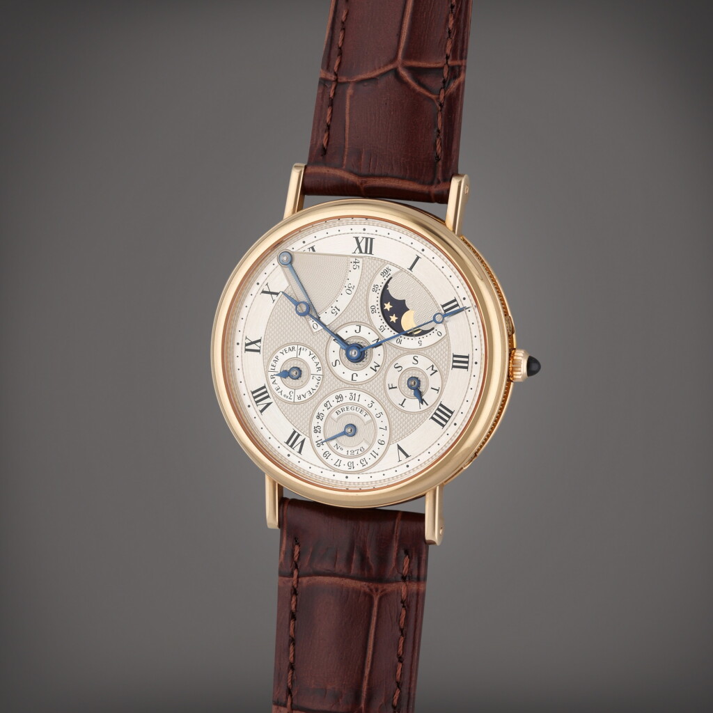 View full screen - View 1 of Lot 104. Reference 3310 Classique | A pink gold automatic perpetual calendar wristwatch with moon phases, and power reserve indication, Circa 1990.