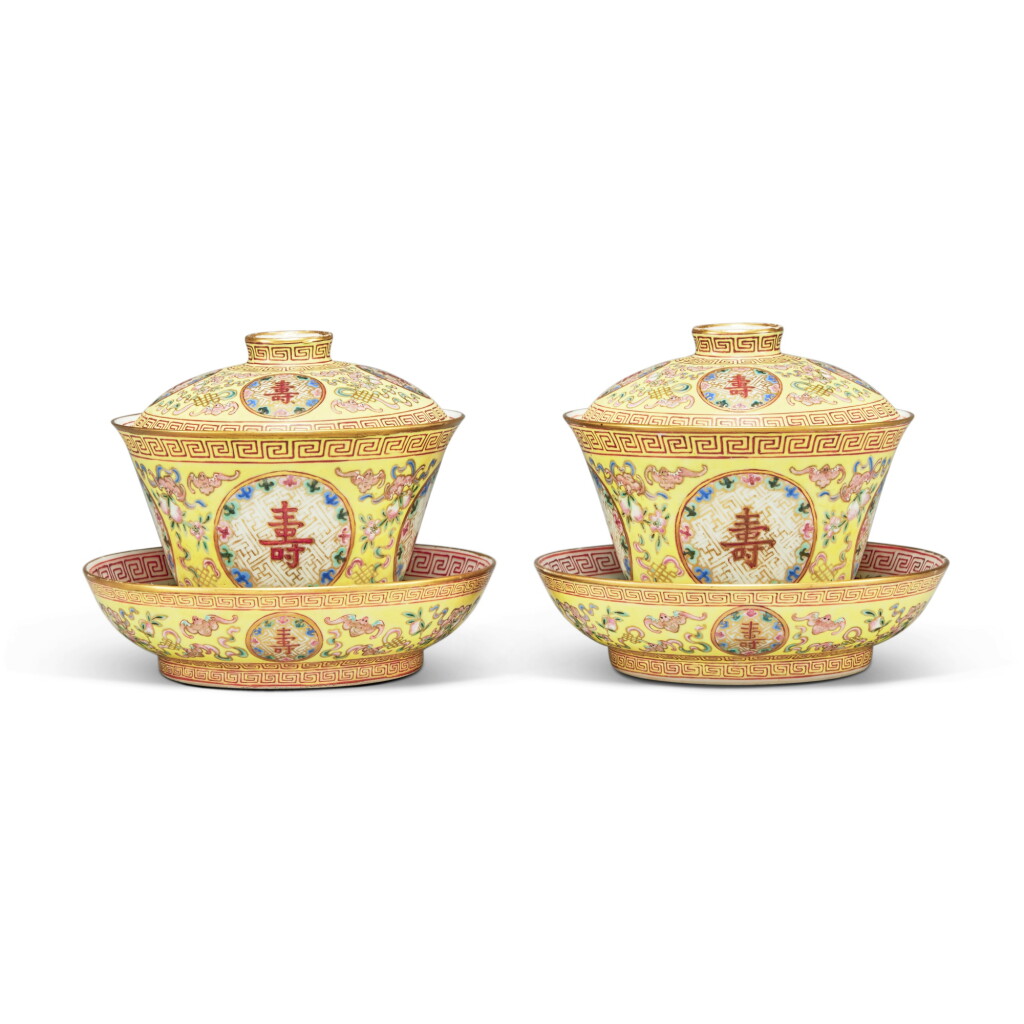 View full screen - View 1 of Lot 540. A pair of yellow-ground famille-rose 'longevity' bowls, covers, and dishes, Qing dynasty, Tongzhi period | 清同治 黃地粉彩開光「萬壽無疆」蓋盌連托兩套 《長春同慶》款.