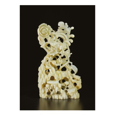 View full screen - View 1 of Lot 661. A WHITE JADE 'BIRD AND FLOWER' GROUP, QING DYNASTY, 19TH CENTURY.