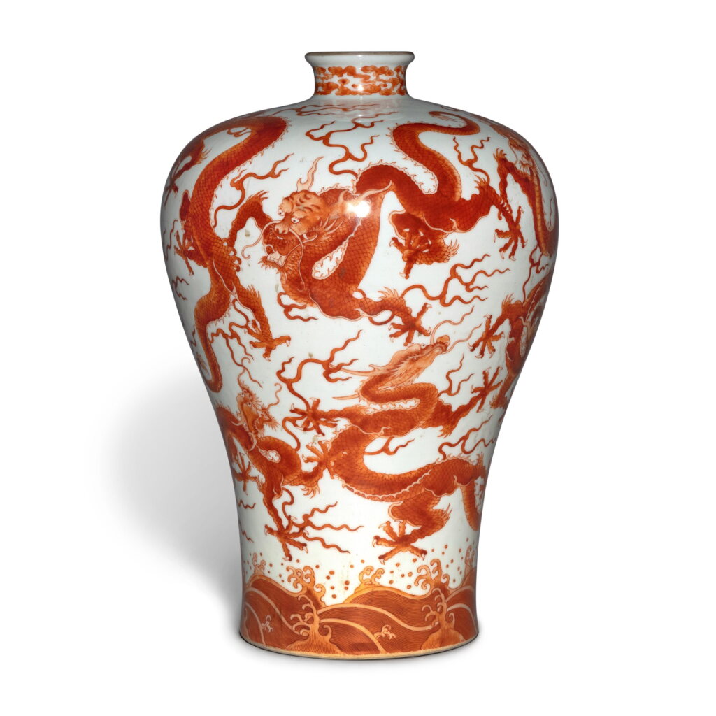 View full screen - View 1 of Lot 376. An extremely rare iron-red 'dragon' meiping, Qing dynasty, Yongzheng / Qianlong period | 清雍正 / 乾隆 礬紅彩海水九龍紋梅瓶.