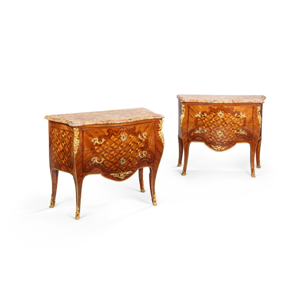 View full screen - View 1 of Lot 138. A pair of Louis XV gilt-bronze mounted satinwood, amaranth, tulipwood and kingwood marquetry commodes, circa 1750, probably by RVLC for Gilles Joubert .