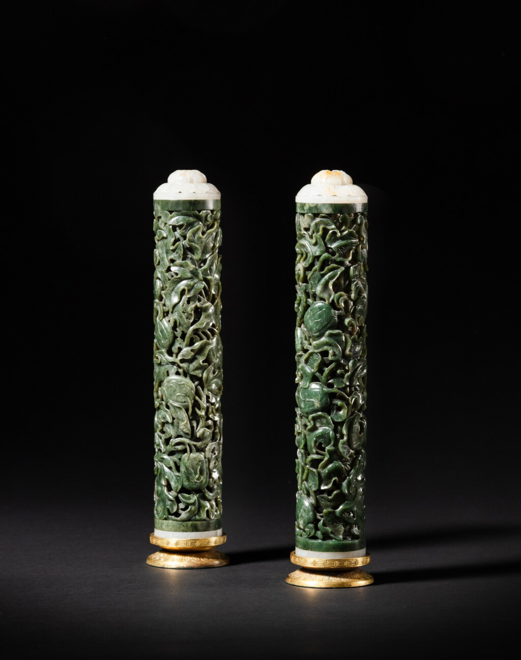 View full screen - View 1 of Lot 206. A pair of reticulated jade 'melon and butterfly' cylindrical incense holders, Qing dynasty, Qianlong period | 清乾隆 碧玉鏤雕蝶瓜圖香插一對.
