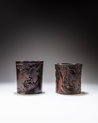 View full screen - View 1 of Lot 120. Two carved zitan 'scholar' brushpots, probably Qing dynasty, 19th century and 20th century | 或清十九世紀至二十世紀 紫檀雕人物圖筆筒一組兩件.