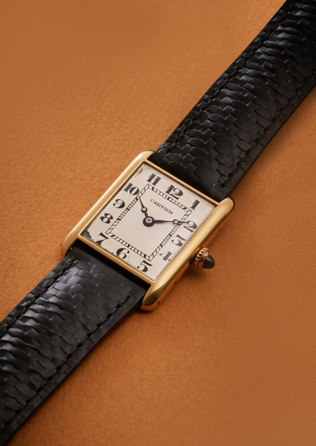 View full screen - View 1 of Lot 107. Tank L.C. | London retailed: A yellow gold rectangular wristwatch with yellow and pink gold deployant buckle, Circa 1927.