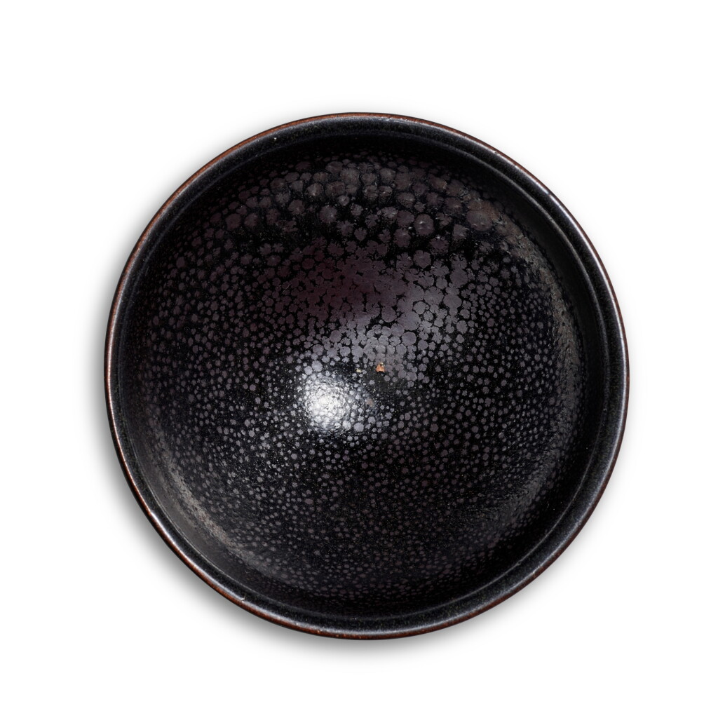 View full screen - View 1 of Lot 826. A small black-glazed 'oil-spot' tea bowl, Song dynasty | 宋 黑釉油滴茶盞.