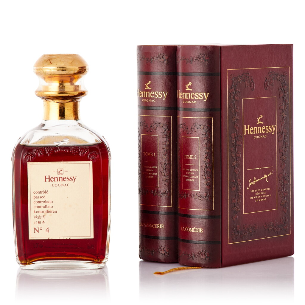 View full screen - View 1 of Lot 661. Hennessy Cognac Library Tome Red 40.0 abv NV (1 BT70).